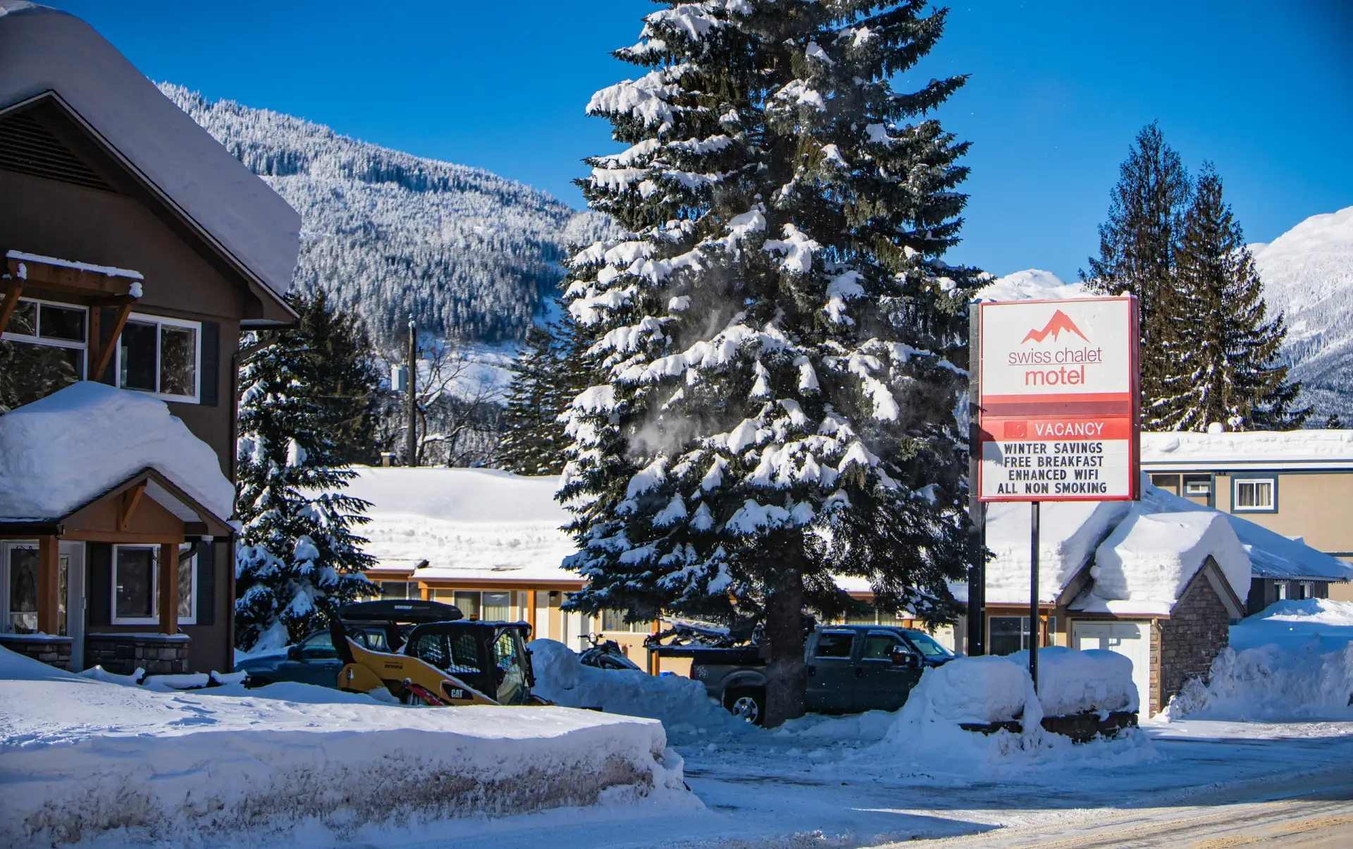 swiss chalet motel winter exterior 03